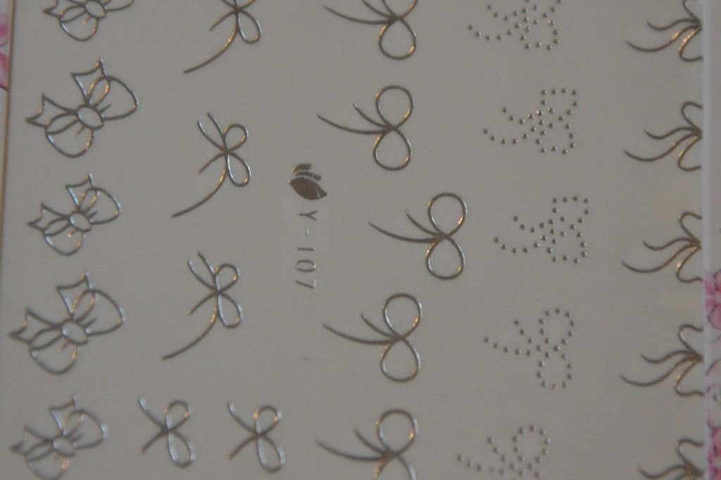 Autocollant Ongle Water Decal 25 petits Noeuds Argentés 107