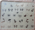 30 Autocollants Ongle Water Decal Coeurs & Noeuds Argentés 34 - NailArtBoutique
